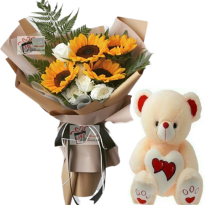 Yellow flower with teddy bear