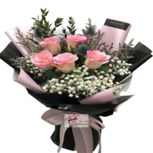 Black packaging with pink flower